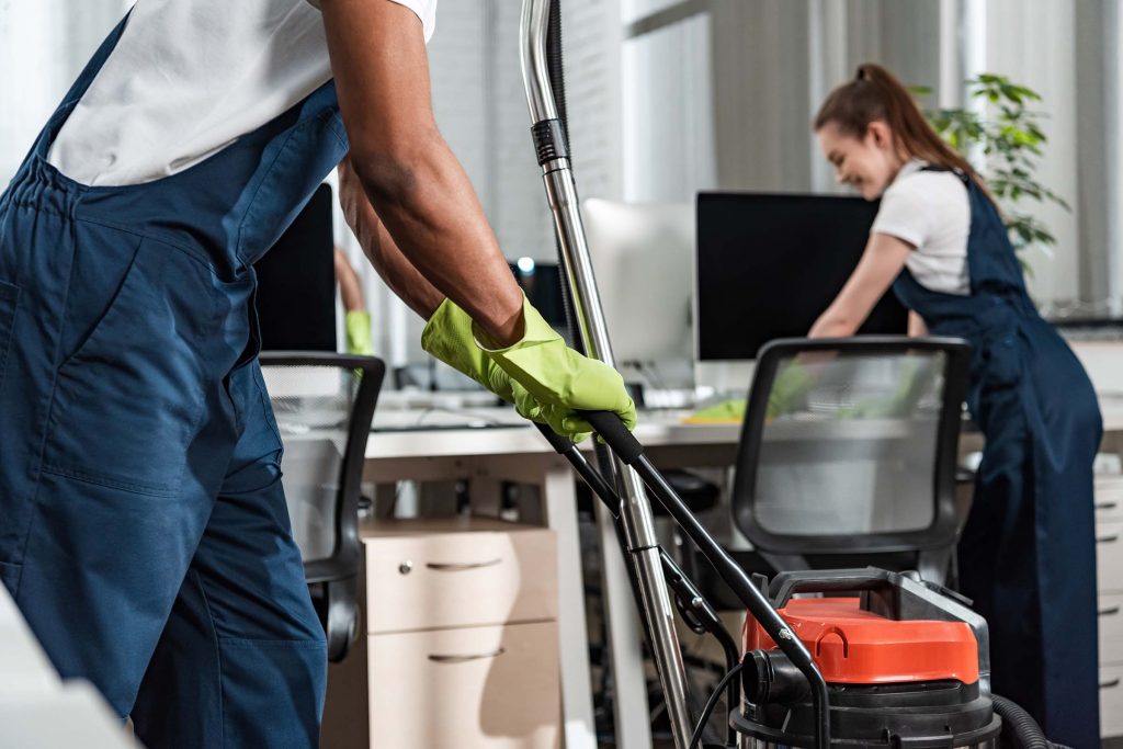 cropped-view-of-african-american-cleaner-moving-va-GBRRTTX.jpg